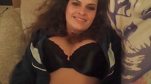 Cute chick plays around her sex organs with dildo