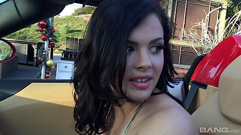 Brunette hottie Kiesha Grey quite the curvaceous beauty in a sexy red convertible
