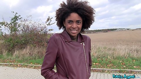 Smiling ebony girl Luna Corazon offered cash on the road