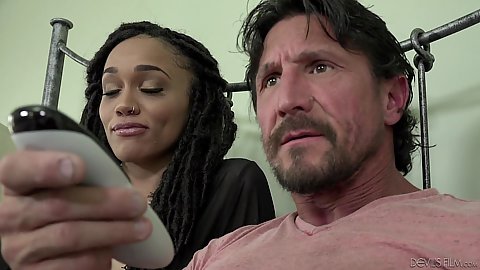 Interracial fully clothed couple having a chat watching tv Julie Kay and eating cunt