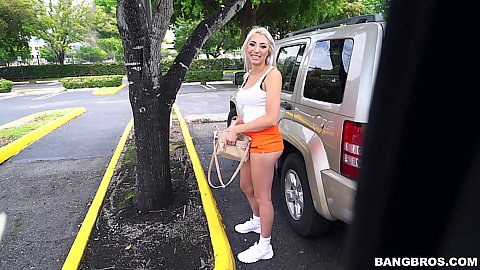Blondie with very inviting organge shorts Jessica Jones picked up with cash on the parking lot