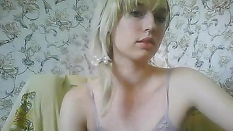 Cute blonde teen in a see thru dress