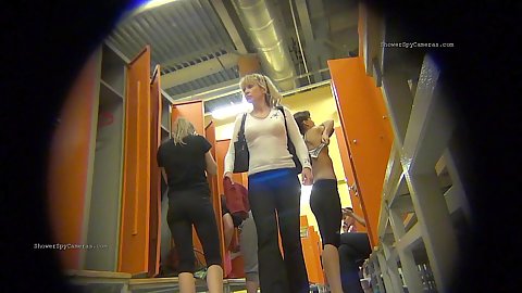 Spy camera installed in the unsuspecting womens change room to watch them get naked and put on clothes