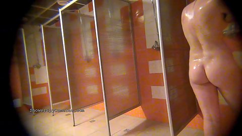 Spy camera showing naked women in communal showers washing themselves unsuspecting of being spy filmed
