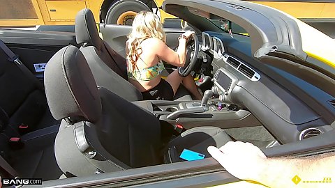 Blonde milf housewife Tucker Stevens driving a nice yellow car has an engine malfunction and calls a mechanic in public