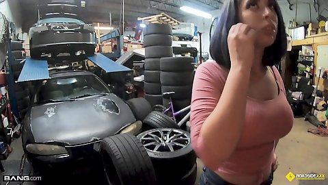 Shorts wearing latina Nina Lopez at the mechanics shop talking about getting a discount but he only wants to see her titties