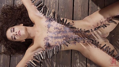 Victoria Voxxx suffering brutal kinky pain with clothespins pinching her skin including hot wax on her skin and fingered with rubber gloves