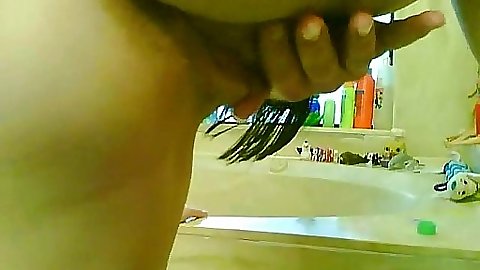 Slut with shavred cunt oiled up touching herself