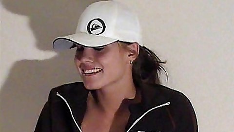Hot babe is being a tom boy in a baseball cap