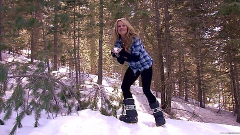 Kelly Madison big sized tatas blonde milf wearing sunglasses public outdoor play in the snow making some snowballs and having loads of fun in the woods then heading to the public parking lot