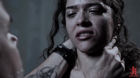 Nonresistant dungeon tied brunette small boobies white gal Victoria Voxxx grabbed by the neck pain fetish slave while being chain tied to a chair in the basement enduring pussy torment