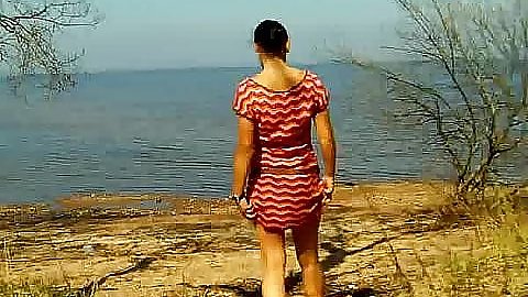 Hot chick outdoors in a dress with no panties