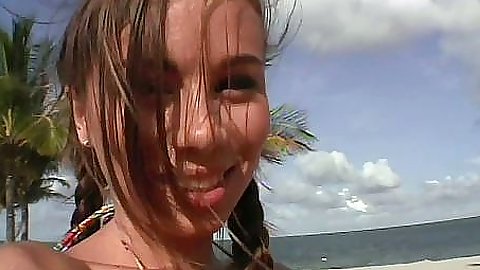 18 years old Alexiss Capri playing in the sand