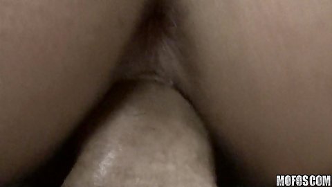 Reverse cowgirl on tanning salons floor