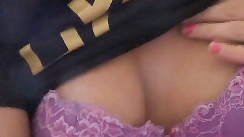 Hot babe shows and plays with tits in her bra
