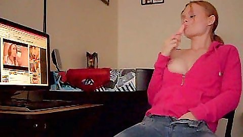 Milf redhead slut watches porn and masturbates