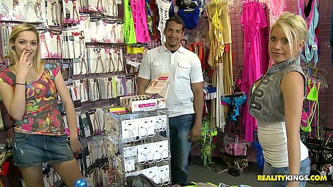 DIrty blone babe at the store showing her tits