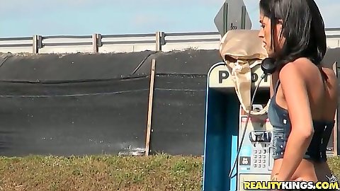 Latina outdoors getting her engine fixed Maria