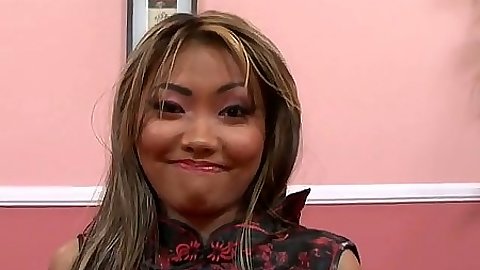 Asian Lina Kina smiling on camera