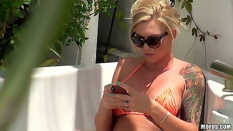 Riley Reece voyeur tanning on the rooftop with dude filming her