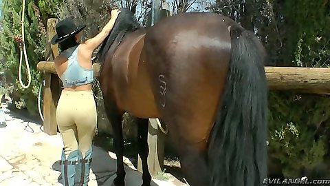 Horny Amanda X in tight pants outdoors then solo stripping