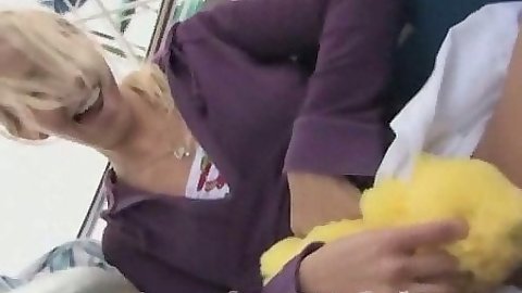 Blonde teen in public sucking the dick while others are about to see it all