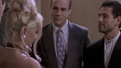 Blonde Stacy Valentine fully clothed dinner party